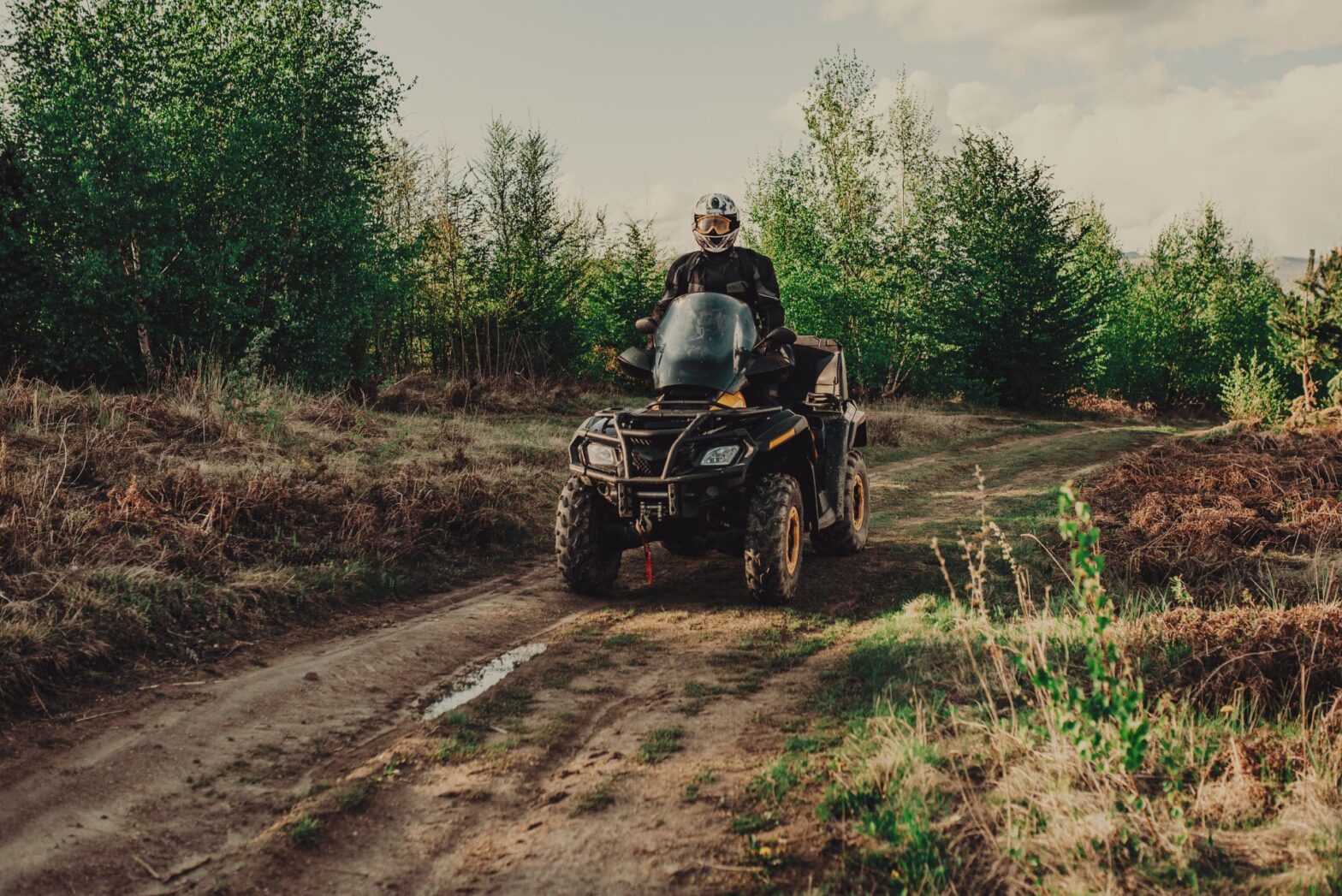 a young man on a quad bike
